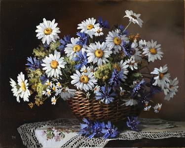 Daisies and cornflowers in a basket thumb