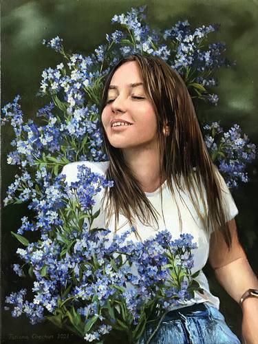 Girl in forget-me-not flowers thumb