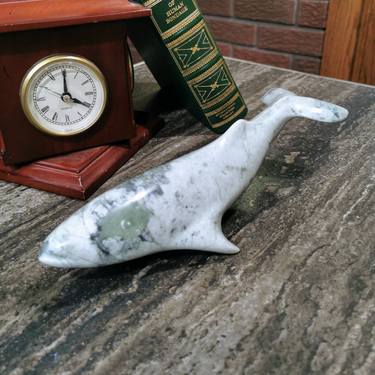 Green marble whale thumb