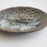 waves crashing ceramic plate side view