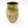 Ceramic and gold vase