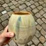 ceramic vase with gold rim