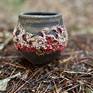 Organic ceramic vessel on the forrest floor