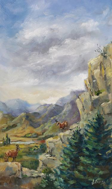 Mountain landscape with wild goats thumb