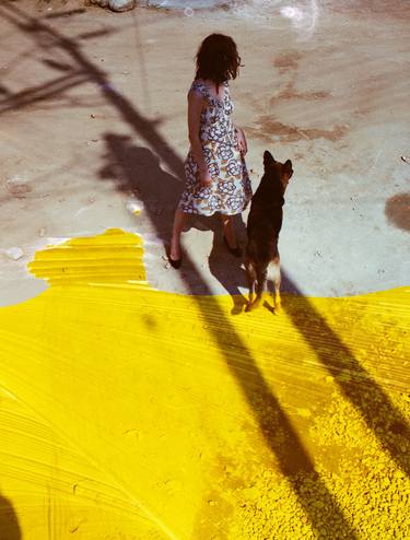 Lia with dog on yellow thumb