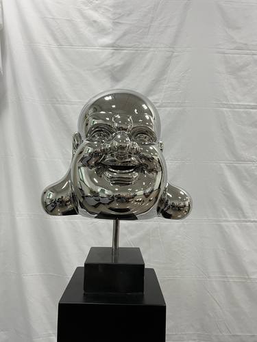 Stainless steel buddha head thumb