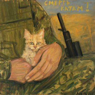 cat in arms of a soldier thumb