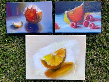 Solar citrus fruits. Composition of 3 canvases. thumb