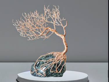 Tree, with copper wire placed on a natural  stone thumb