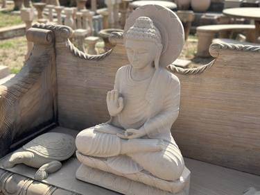 Buddha sculpture made with stone thumb