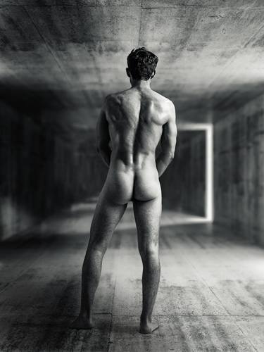 Naked man facing the unknown - male nude from behind thumb