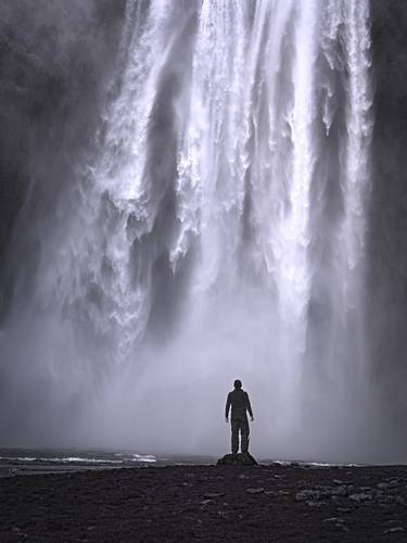 Man and the waterfall thumb