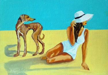 Girl on beach and dog thumb