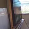 On the easel in the studio side view