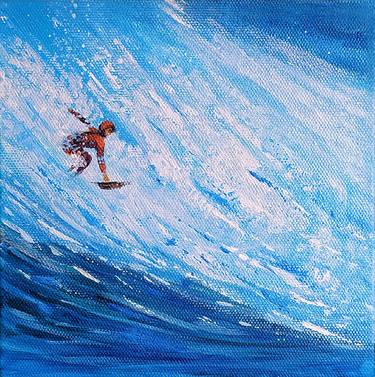 Surfing in the ocean thumb