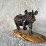 Black rhino: bronze, wild olive base. Mike Exelby