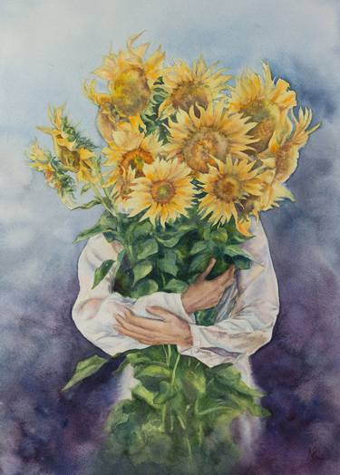 Sunflowers in woman's hands. Ukraine. thumb