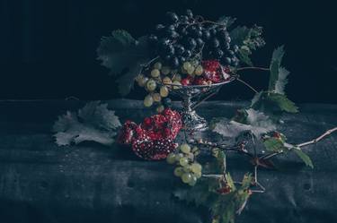 Serving bowl with pomegranates and grapes - still life thumb