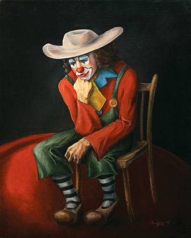CLOWN - A sad clown sitting in a circus thumb
