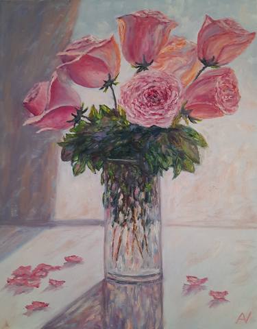 Pink roses in a crystal vase bathing in sunlight thumb