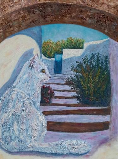 White cat in a traditional Mediterranean courtyard thumb