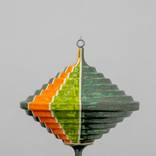 ''Spinning top in the green