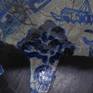 I love the willow pattern and I love painting horses so I've combined the two to be like cracked, faded china that you find on the seashore. There are willow pattern bluebirds in relief in the corners.