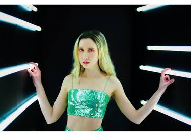Radiant Glow: Model Amidst Tube Light Serenity thumb