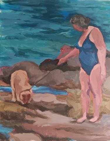 Woman at beach with dogs thumb