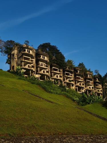 Dilapidated homes on hillslopes. thumb