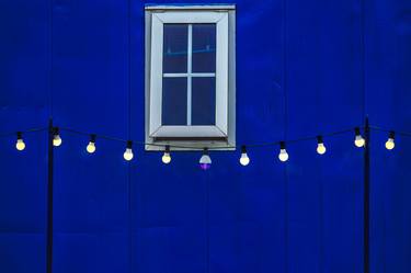 Luminous Serenade in Blue: A String of Yelloe Bulbs thumb