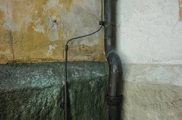 Textures of Time: Where Pipe Meets Wall thumb