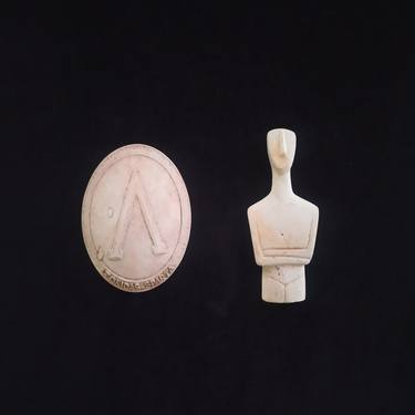 Shield and figurine thumb