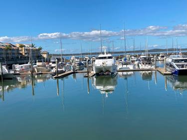 Boats in blue thumb