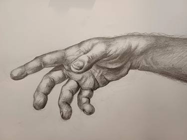 Hand with 6B pencil thumb