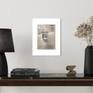 Artwork in white mat, unframed
