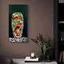 Ceramic vase with swimming fish on the wall