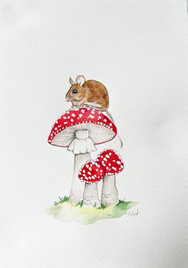 Field mouse on a fly agaric thumb
