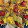 Flowing red hair blending with golden leaves