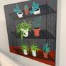 From a continuing series of plant stands as the subject matter, this painting a black mid-century modern wire structure shelves a variety of houseplants. Composed by vertical lines and diagonal lines one straddling the right edge of the picture plane contrast against the organic plants.
A process video of this painting is on Youtube: https://www.youtube.com/watch?v=HEUm7H4oULY
Signed, titled, and dated on the back. Wired and ready to hang.