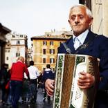 Man plays accordion on the street near Pantheon, Rome 2009 by Rodion Kovenkin
