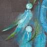 Feathers and beads - close-up in detail