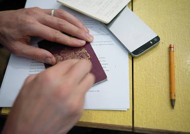 National emblem being removed from a passport during EUROPEAN PA55PORT at MOCA London October 2018 thumb