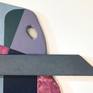 close up of cutout and wood piece