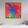 Image with black floater frame on a wall