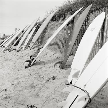 Surfboards Leaning on a Fence thumb