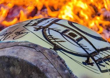 Candombe drum being tempering at street, montevideo, uruguay thumb