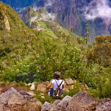 Woman Resting at Highs of Machu Picchu Mountain thumb