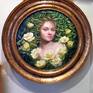 This is a very dreamy, romantic hypnotic painting of a woman surrounded by leaves and yellow roses. She appears to be emerging out of a garden that surrounded her somehow.
