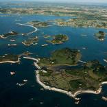 Ile Yvinec. Small Connected Islands with Houses by J Henry Fair